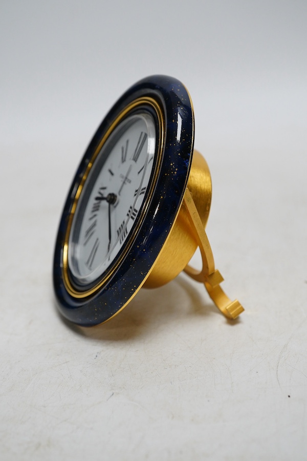 A modern Cartier gilt metal quartz travelling clock. 9cm. Condition - good, not tested as working